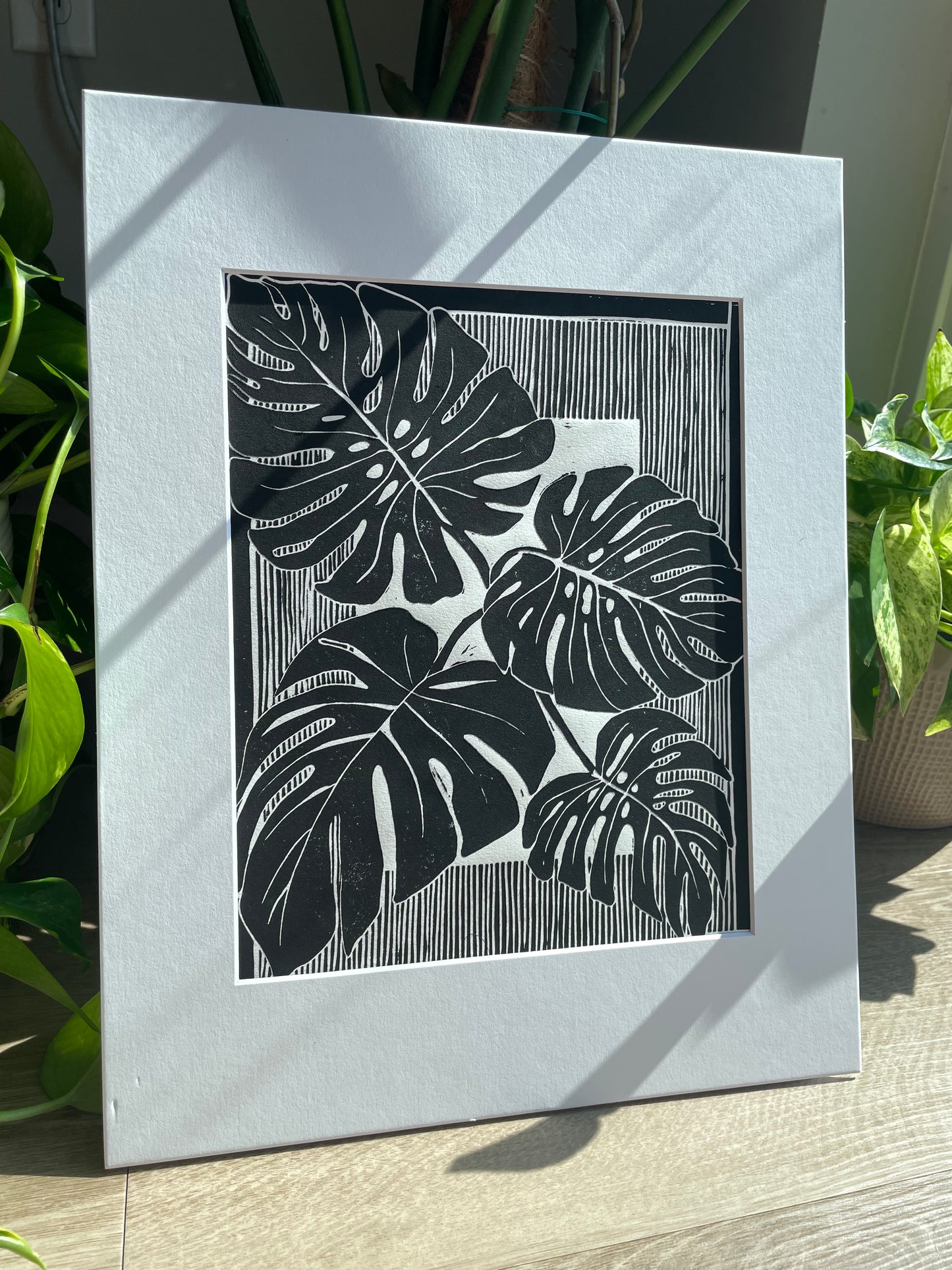 Monstera Leaves Linocut Print in Black ink (matted to 11x14”)