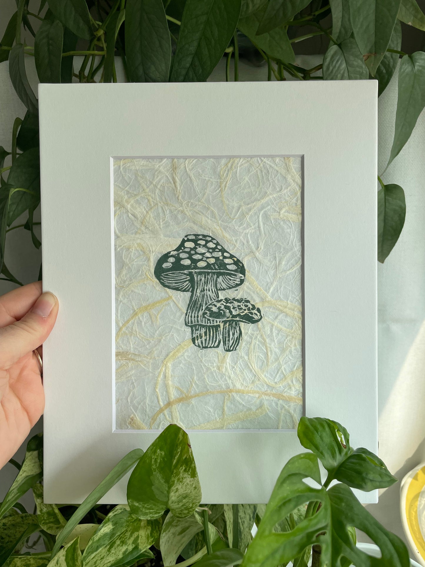 Mini Mush linocut printed on handmade plant fiber paper matted to 8x10”